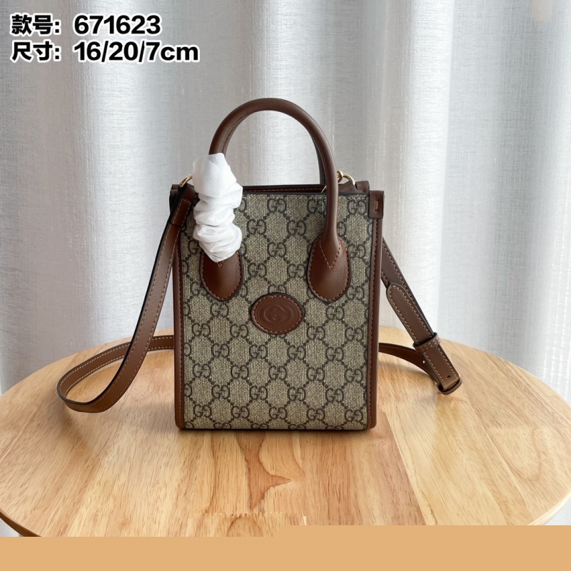G*u*i top handle bags
